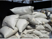  بالصور: الشرطة تعثر على طن سموم ومسدس في يافا وتعتقل مشتبهيّن